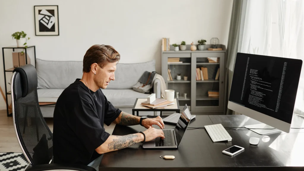 Software engineer from Scorpion Five Technologies creating small business custom software to help a client gain a competitive advantage, enhance operations, and drive innovation.