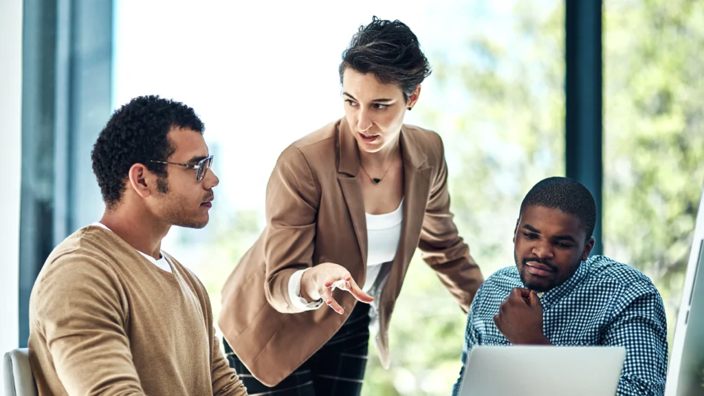 Small business team collaborating with Scorpion Five Technologies on website development strategies to build a professional online image, enhance customer engagement, and drive more website visitors.