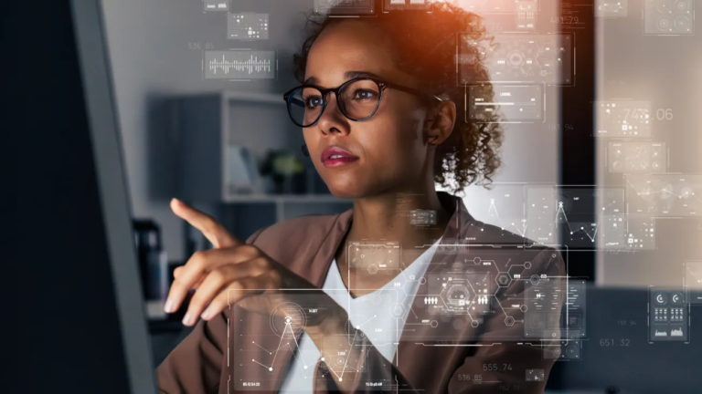 Software developer coding and creating tests to ensure nothing breaks as she keeps software up to date with business requirements.