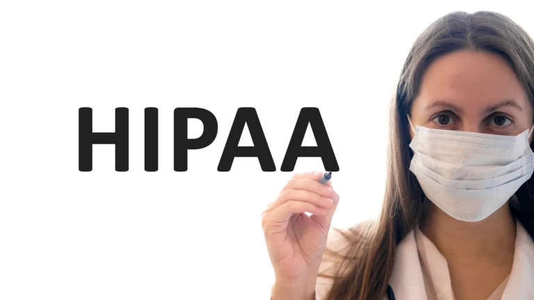 Healthcare provider wearing a medical mask writing “HIPAA,” symbolizing HIPAA compliance, HIPAA security rule requirements, and PHI protection for growing medical practices, as explained by Scorpion Five Technologies.